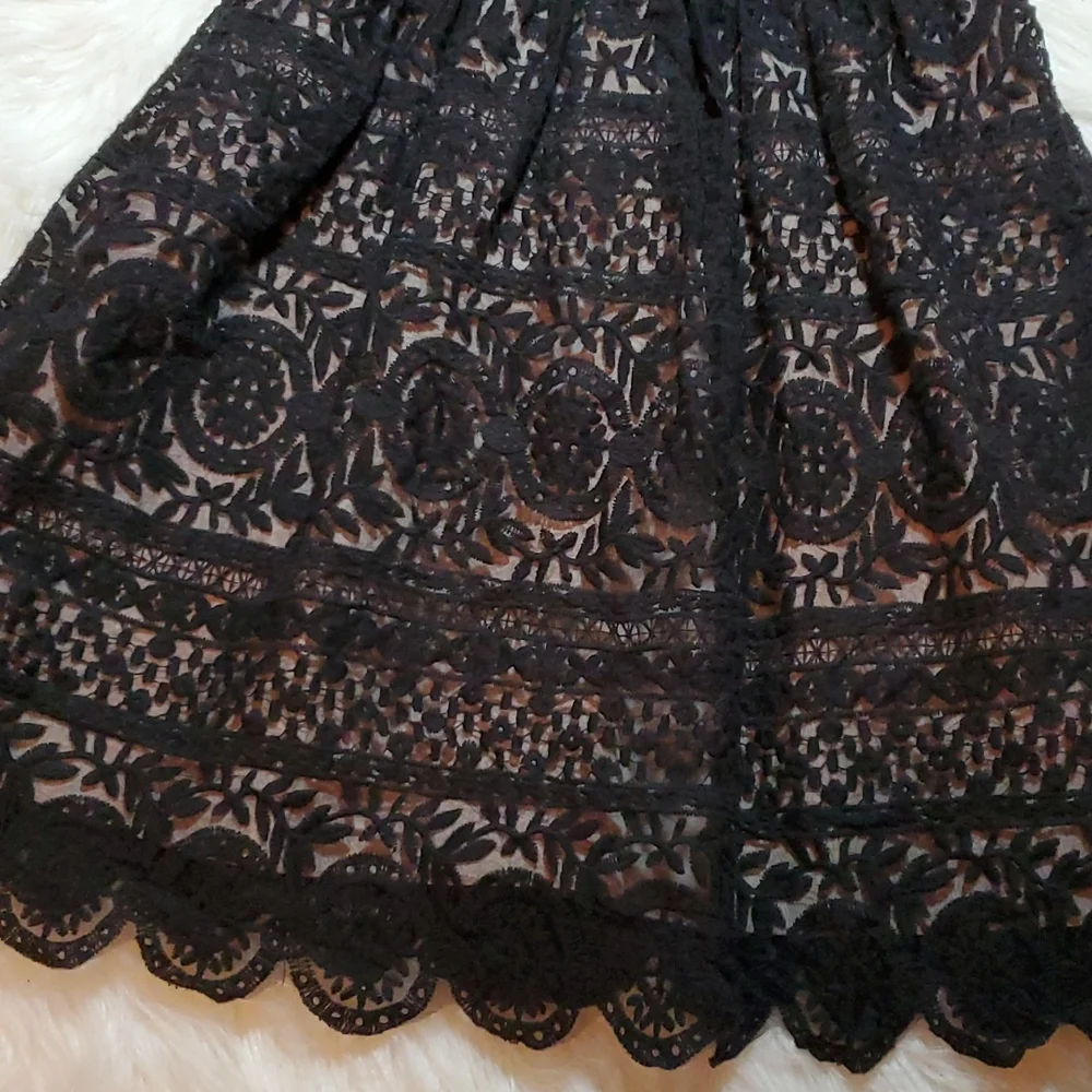Soprano black with cream underlayer size small in like NEW condition